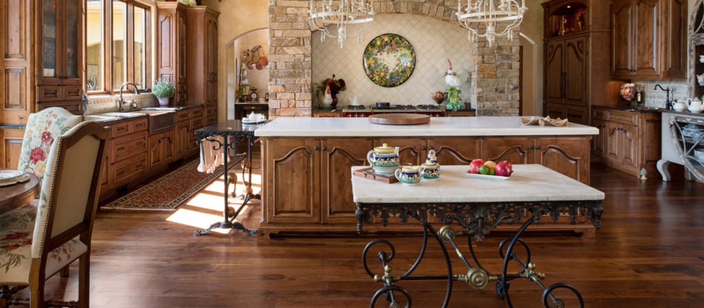 Traditional kitchen with wood cabinets and polished wood flooring